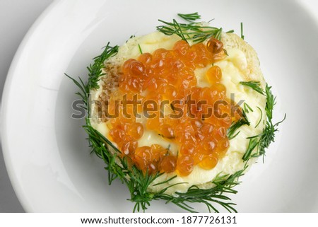 Kanapes with butter and red caviar Stock fotó © 