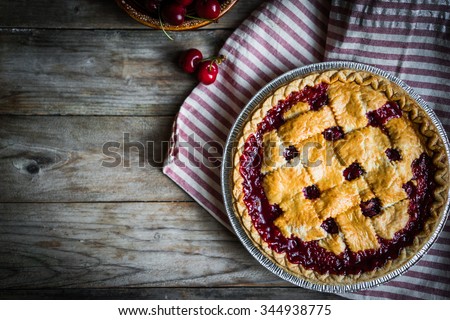Similar – Image, Stock Photo Sliced blueberry pie. Lattice crust cake top view