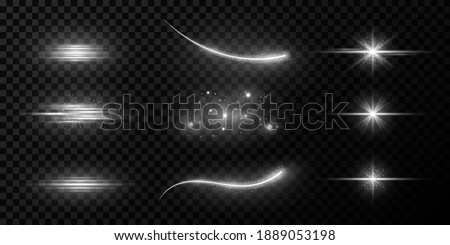 Collection of glare, stars and rays on a dark transparent background. Flying star effect. Elements for a night scene. Beams of light with glowing particles. Vector illustration. EPS 10 Foto stock © 