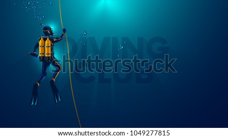 One scuba diver underwater. Back view. Diver look on big logo diving club underwater. Diver dives to the bottom of the sea, holding the rope, The sun's rays underwater. Scuba diving background.