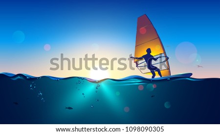 Windsurfing on sea landscape and clear sky background. Man Windsurfer on the Board with a sail floating on the sea at sunset.