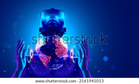 Virtual reality digital technology concept. Man wearing 3d VR headset glasses looks up, holds the globe in his hands of digital world. Virtual reality, Augmented reality or AR in metaverse simulation