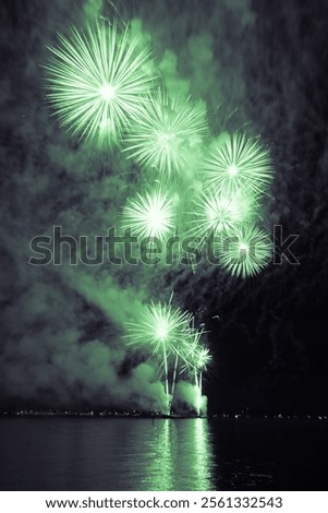 Similar – Image, Stock Photo Luxury fireworks event sky show with red big bang stars. Premium entertainment magic star firework at e.g. New Years Eve or Independence Day party celebration. Black dark night background