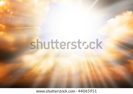 Heaven religion concept - sun rays through the clouds