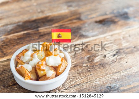 Similar – Image, Stock Photo Patatas bravas with ajoaceite, Spanish tapa