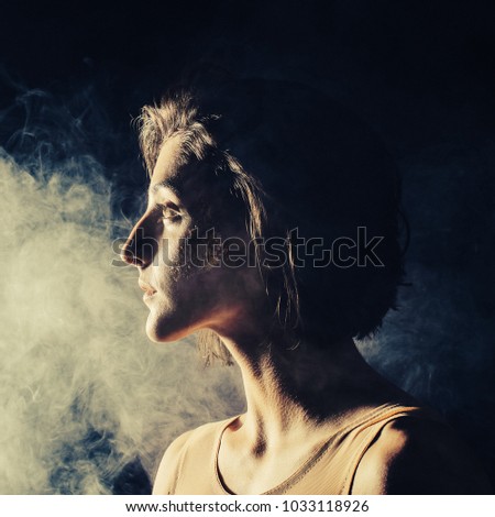 free photos female portrait with side lighting and smoke avopix com