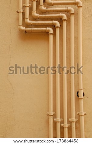 Pipes on the wall - all in one color.