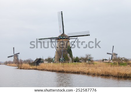 Dutch windmills with canal reflections at Kinderdijk, Netherlands