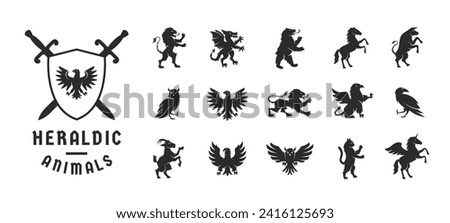 Heraldic animals set. Animals elements  for Coat of Arms, Crest design. Heraldic symbols. Dragon, Goat, Owl, Lion, Eagle, Raven, Griffin, Cat, Horse, Bear silhouettes. Vector illustration. 