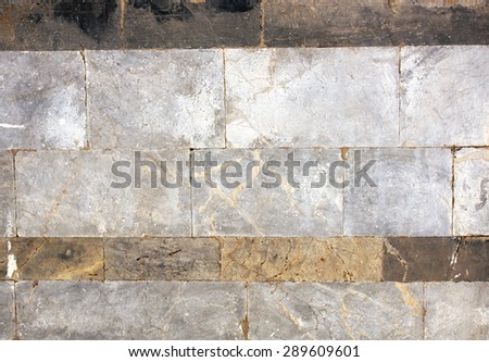 Ancient wall of marble blocks