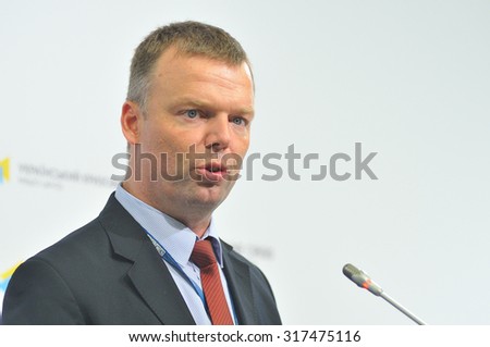 KIEV, UKRAINE - MAY 21, 2015: Alexander Hug, Deputy Chief Monitor of the OSCE SMM in Ukraine reads a report of the current state in the occupied territory of Ukraine at a press briefing