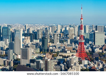 Japan. Tokyo. Tokyo Television Tower rises above the city. Panorama of Tokyo with a television tower. Japanese city top view. Red television tower. Sights of Japan. Japanese city landscape.