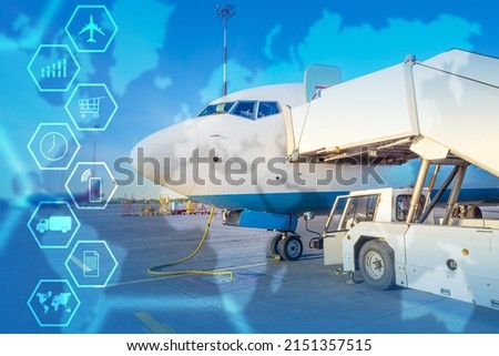 Transportation of goods by air. Air cargo logistics. International air transportation. Transportation of goods by aircraft. Cargo plane on runway. Autotrap in front of avia liner. Imagine de stoc © 