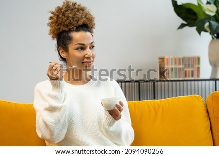 Similar – Image, Stock Photo African American woman eating strawberry