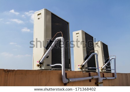 Outdoor Unit of Air Conditioner with blue sky.
