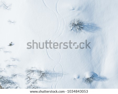 Similar – Foto Bild Bäume von oben im Winter schneebedeckt von einer Drohne gefilmt