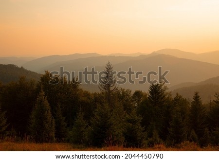 Similar – Foto Bild Sonne scheint am nebligen Morgen über den Bergen