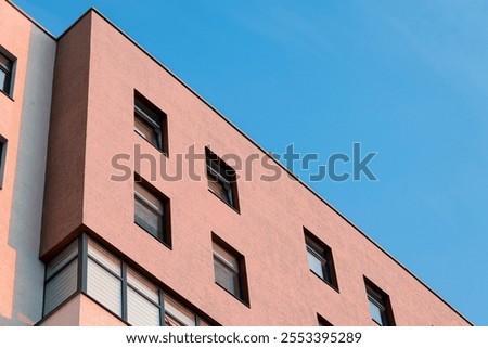 Image, Stock Photo Boringly colored concrete wall with a gap through which a bit of green creeps through.