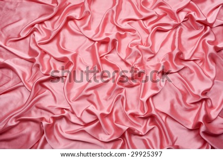 The pink satin in random pattern is shot in wide angle, can be use for background, card design, etc.