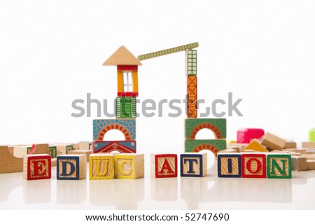 Education for pre-school concept from toy and alphabet blocks. *** Main focus on EDUCATION word block ***