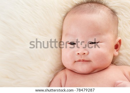 Cute Chinese Baby Boy Taken Close Up With Fur Background Finerworks