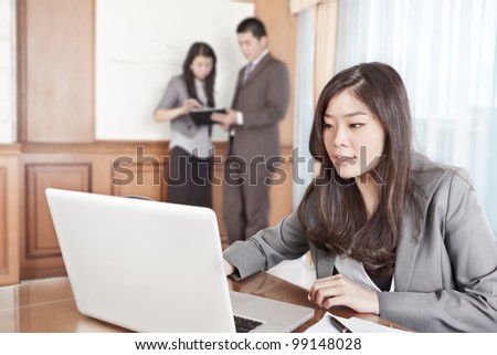 Chinese businesswoman working seriously in the office