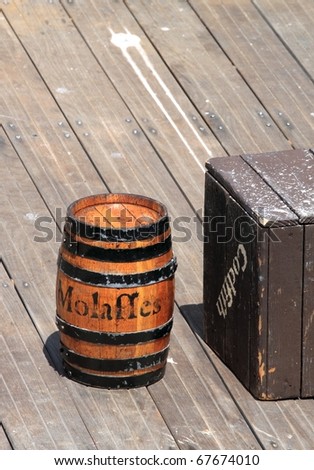 wood barrel standing standing on a wooden pier