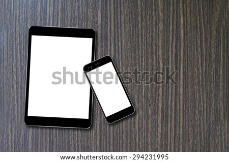 Tablet and Smartphone on wood background with copy space and text space,Responsive web design