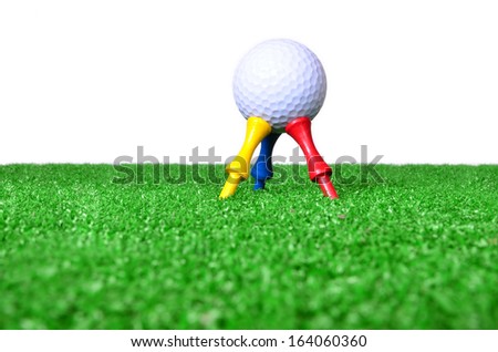 Yellow, blue, red golf tee