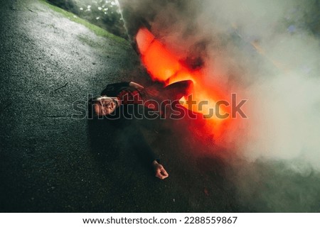 Image, Stock Photo Man with burning fire in dark cave