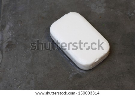 Wet Soap with no bubble on Concrete Floor