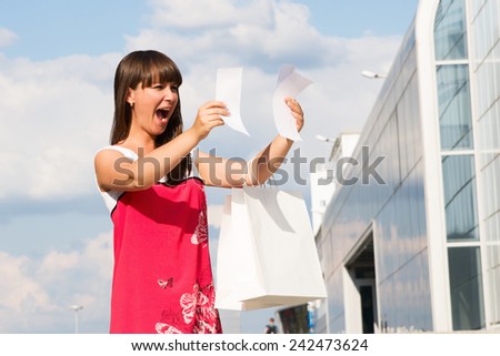 Woman shocked by the amount of the invoice