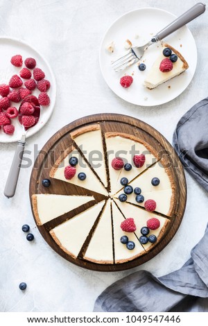 Similar – Foto Bild Käsekuchenscheibe auf blauem Teller. Ein Stück Käsekuchen