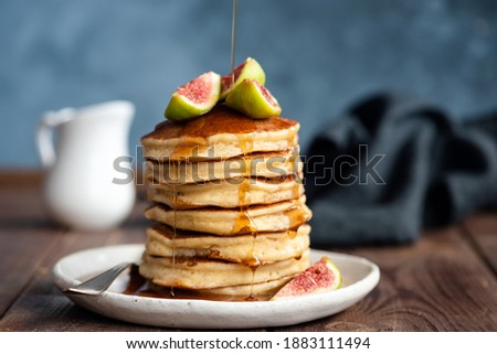 Similar – Image, Stock Photo Honey pouring over fried toasts with fruit