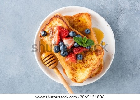 Similar – Foto Bild Frische Erdbeerbrioche auf einem Marmortisch im Entstehen