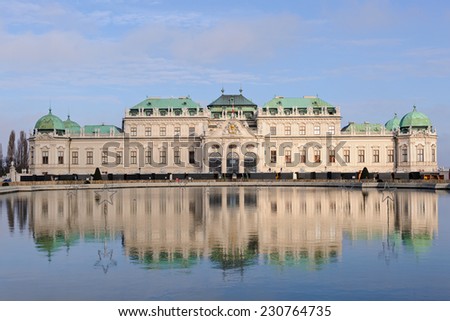 Historic palace Upper Belvedere reflected in water, Vienna, Austria
