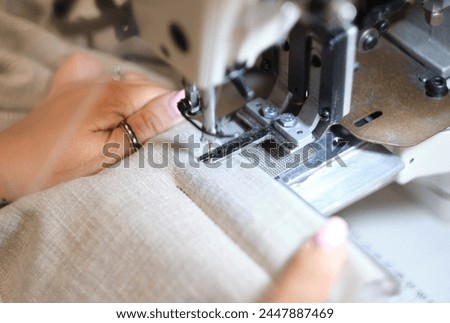 Similar – Image, Stock Photo Sewing machine worked by a seamstress