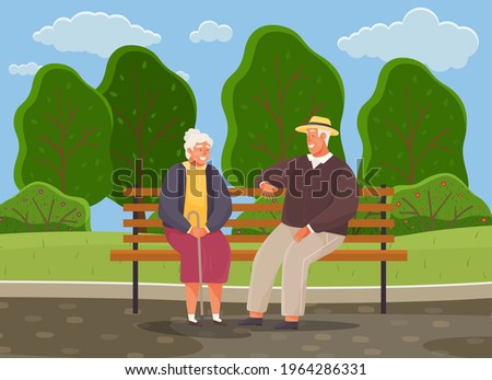 Old woman and man are resting and sitting on bench in park. Grandmother with cane smiling at man in hat. Rendezvous of retirees from nursing home. Elderly people spend time talking together outdoors