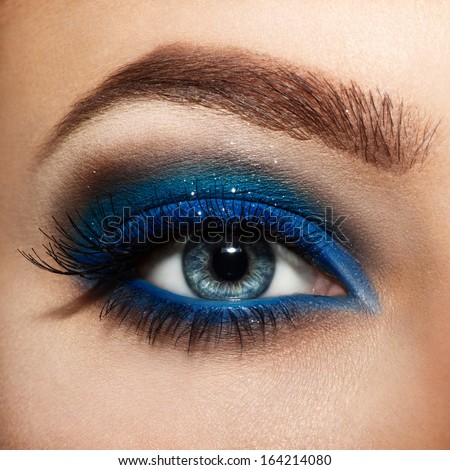 close up eyes with bright makeup.