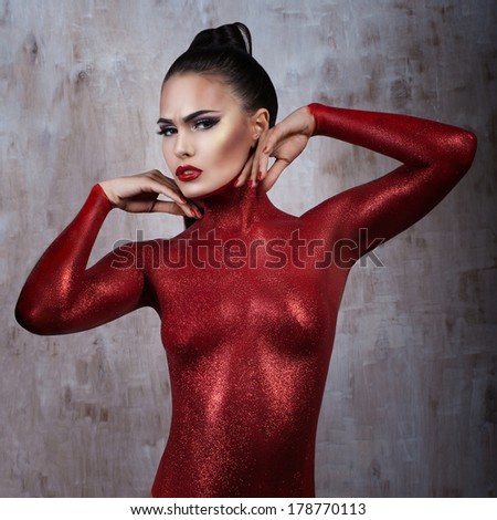 girl covered in red body