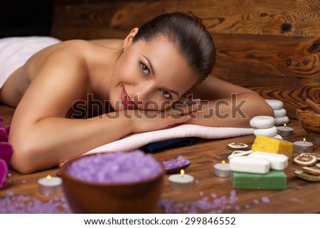 young woman on spa treatments, relaxing mind and body