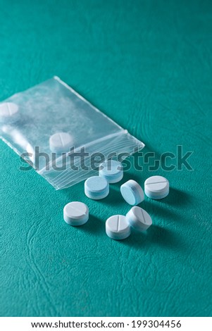 Medicine on green table