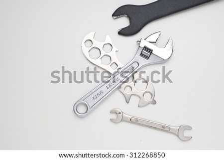 Mechanic tools on white.