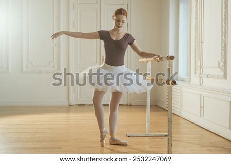 Similar – Image, Stock Photo Young ballerina dancing near palms