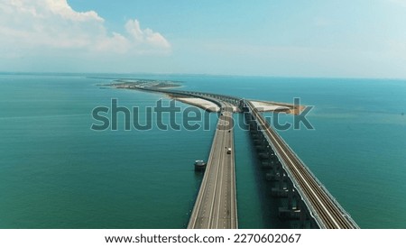 Similar – Image, Stock Photo Bridge over sea on cloudy day