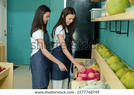 Similar – Image, Stock Photo woman picking peaches in field