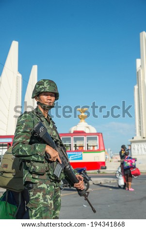 BANGKOK - May 23 :Thai Army officer with rifles patrol around Bangkok after Thai Royal Army coup d'etat government on May 23,2014 in Bangkok, Thailand.