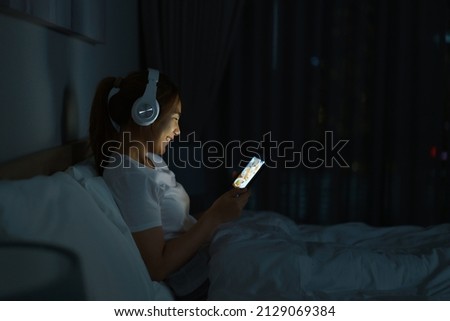 Similar – Image, Stock Photo Woman with headphones before working out in park