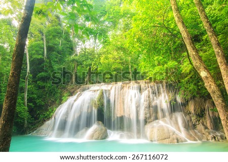 Summer, Travel, Vacation and Holiday concept - Level two of Erawan Waterfall in Kanchanaburi Province, Thailand