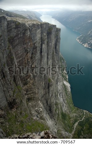 Cliffs of the Norwegian fjords seen from Kjerag. The fjord is Lysebotn